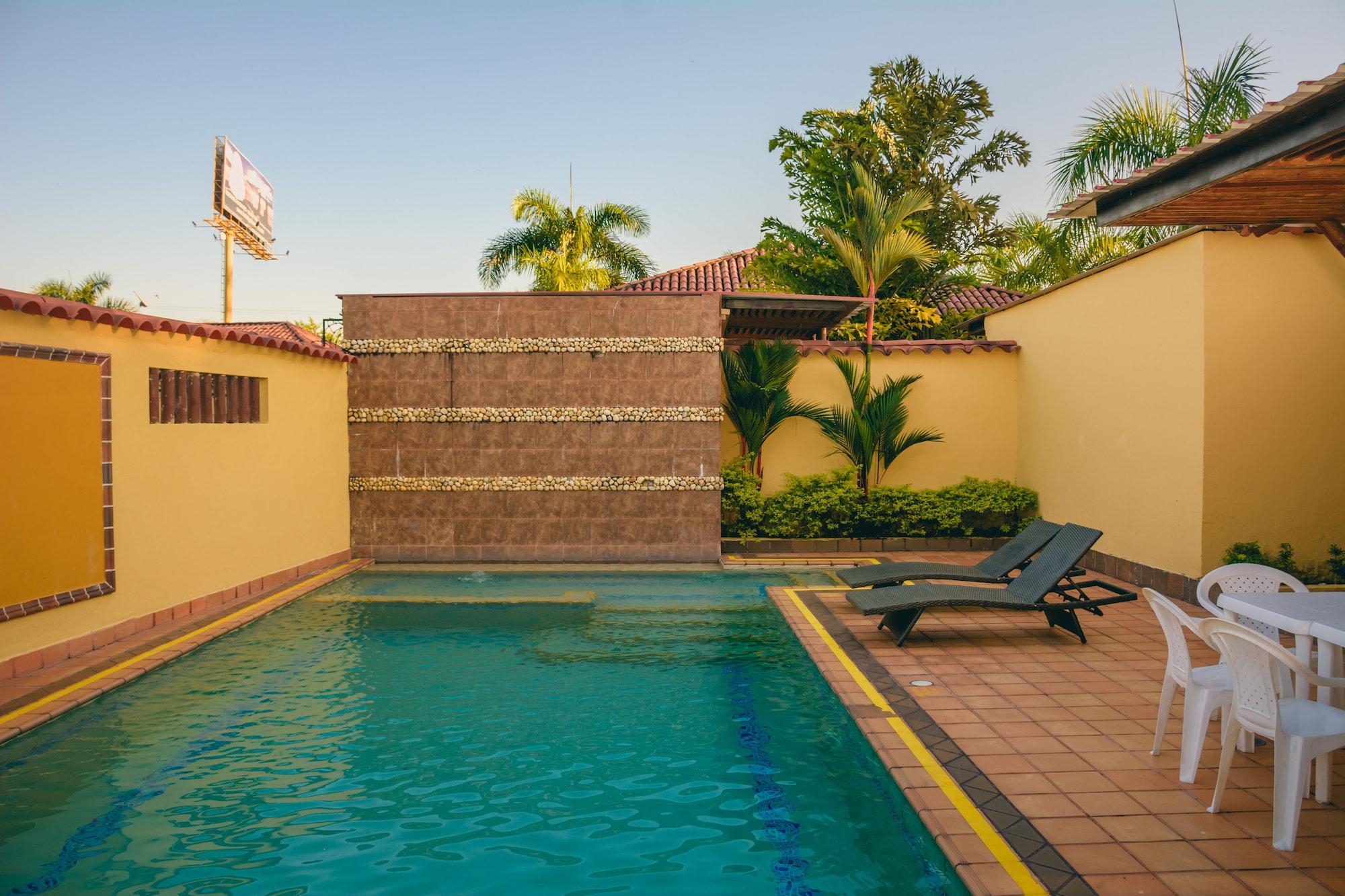 Hotel Paloverde Villas Campestres Apiay Bagian luar foto
