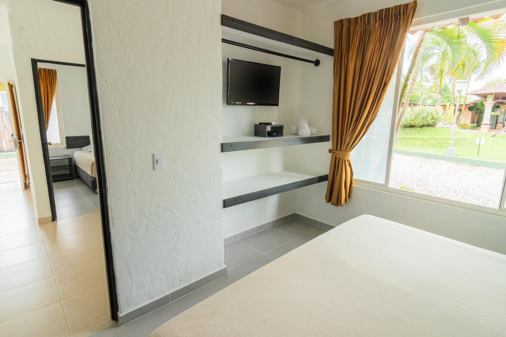 Hotel Paloverde Villas Campestres Apiay Bagian luar foto