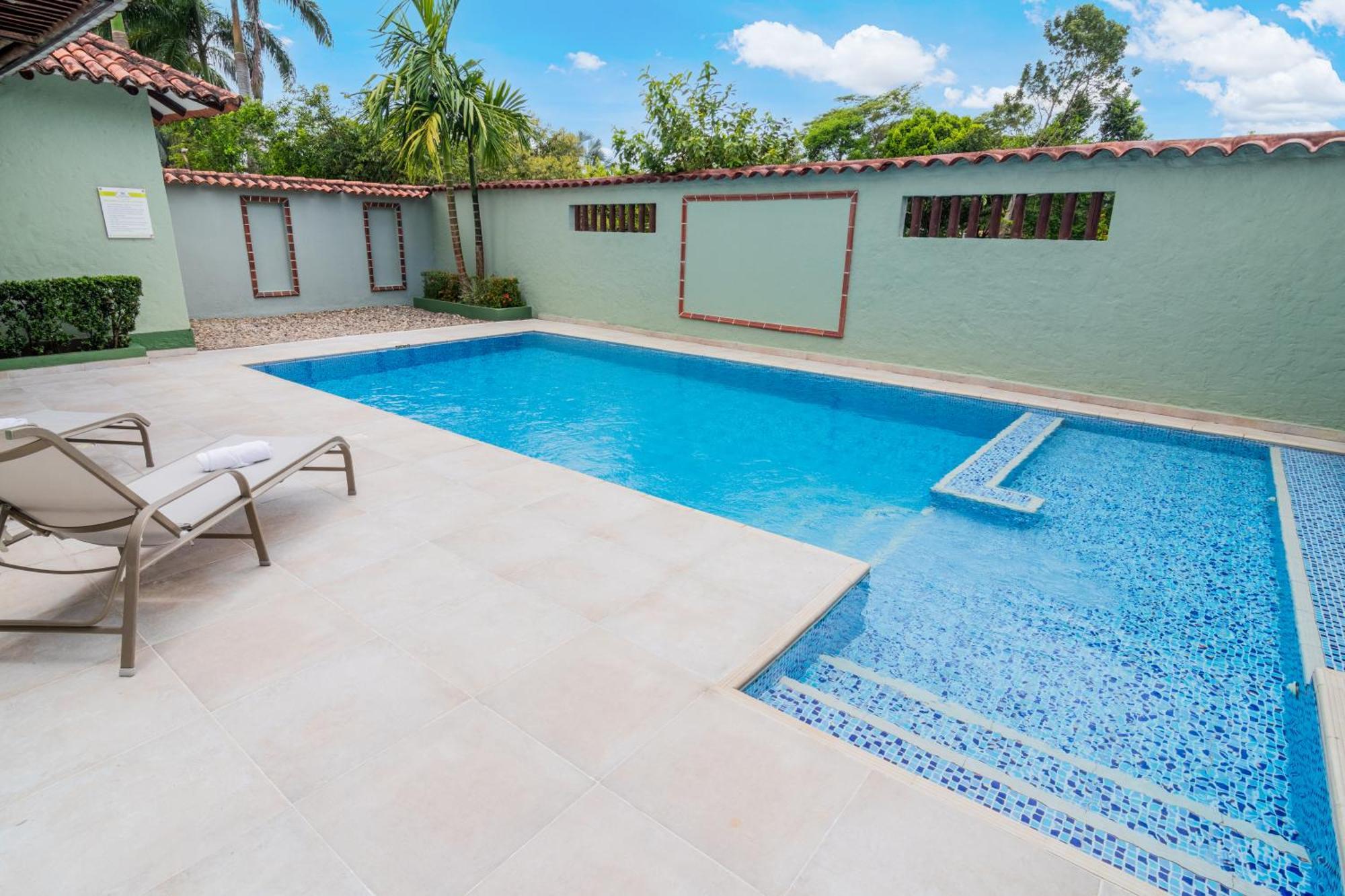Hotel Paloverde Villas Campestres Apiay Bagian luar foto