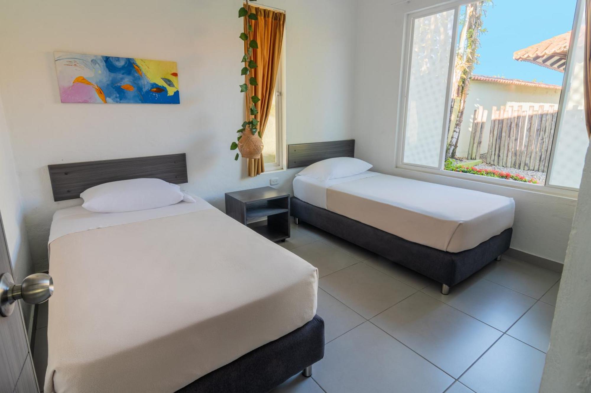 Hotel Paloverde Villas Campestres Apiay Bagian luar foto